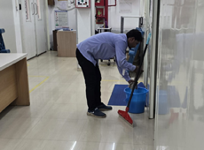 Housekeeping staff cleaning a commercial lobby in Delhi NCR - photo 1